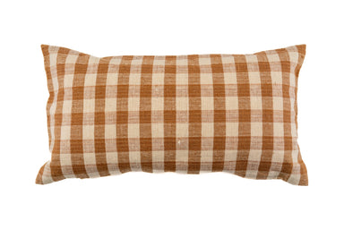 Handwoven organic cotton pillow with natural plant dye.
