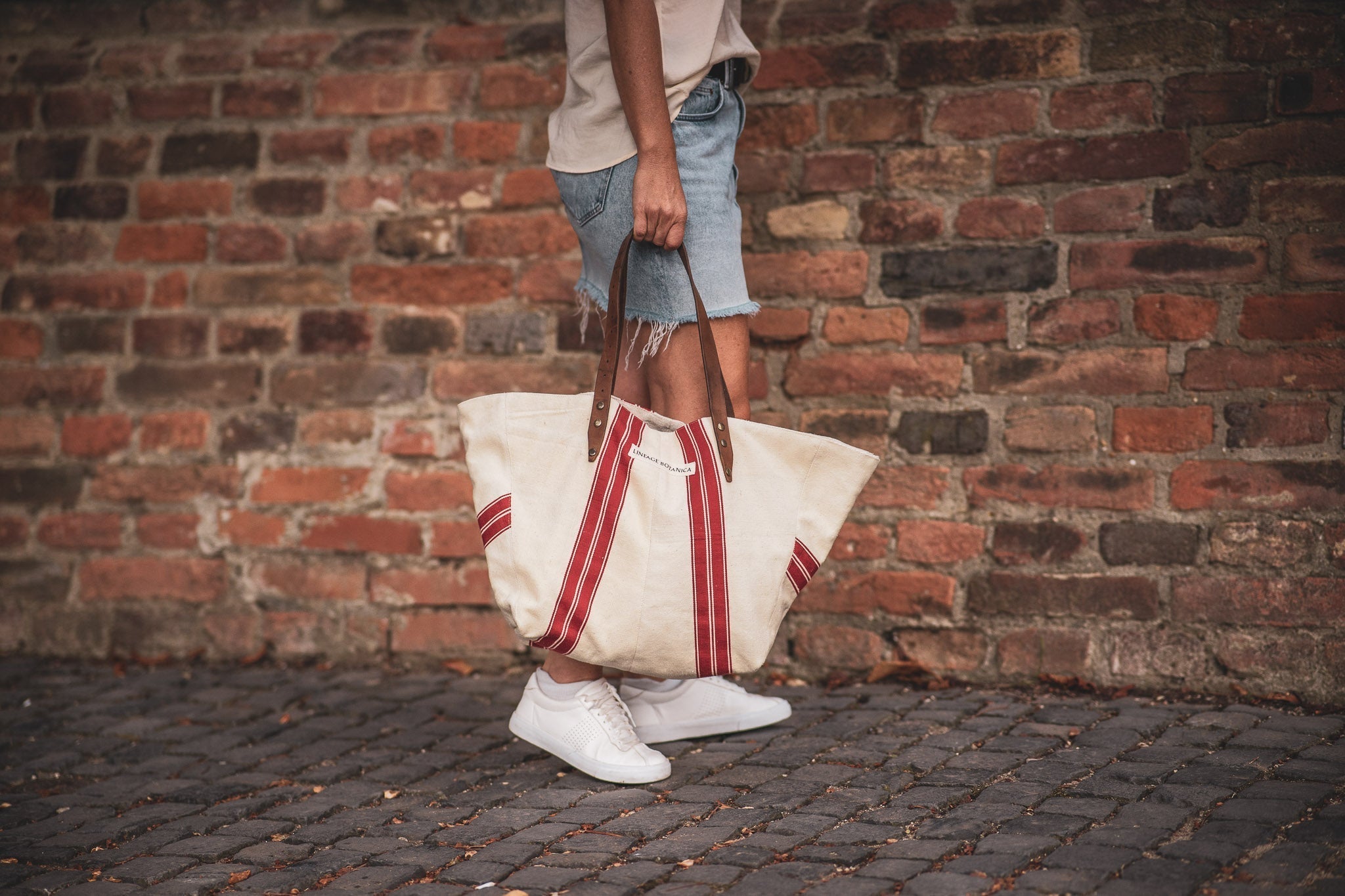 Handwoven antique Hungarian hemp bag, eco-conscious fashion accessory.