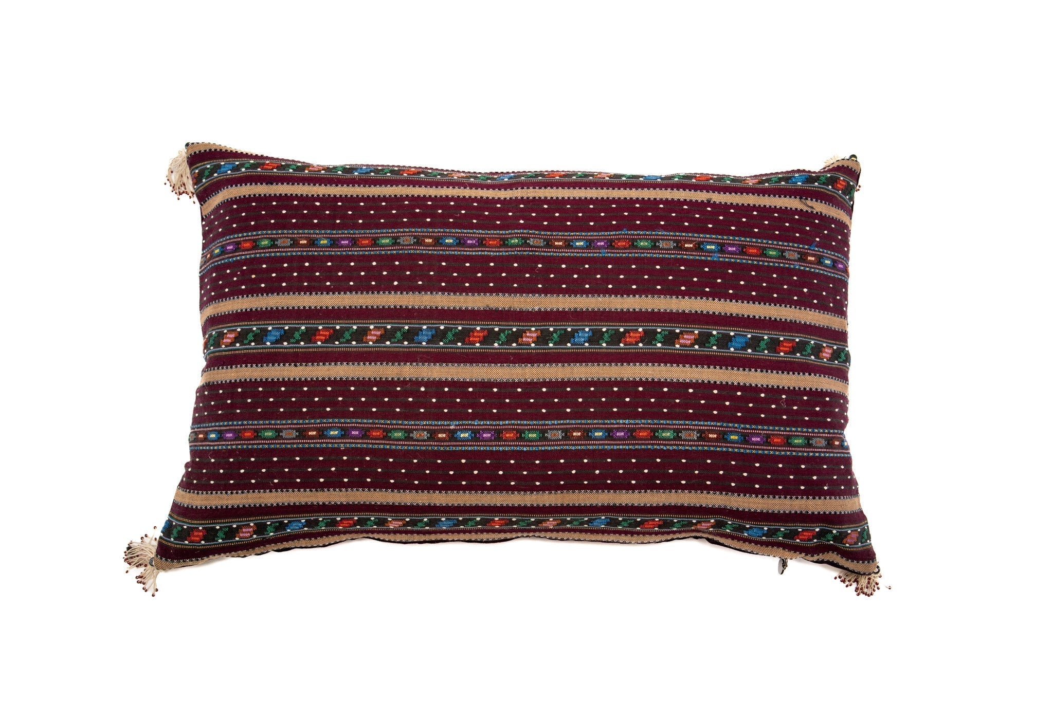 Handwoven Romanian artifact textile pillow with colorful striped pattern.