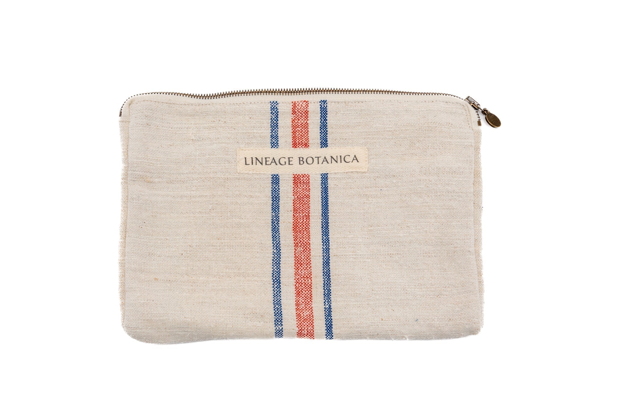 Handwoven antique Hungarian hemp bag with red and blue stripes, zipper closure.