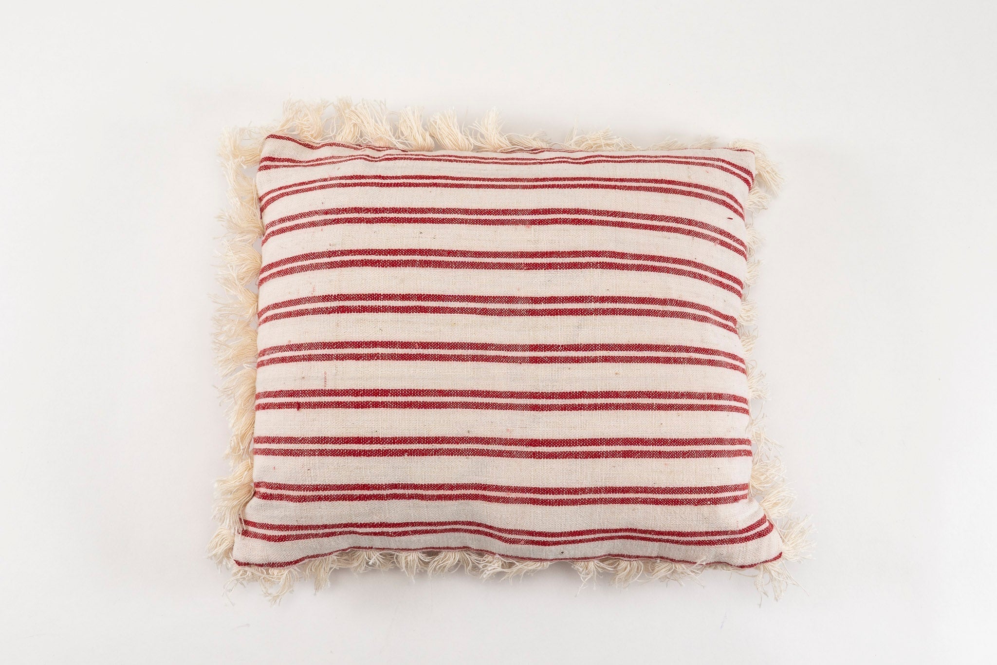 Pillow: Handwoven antique Hungarian hemp with cotton fringe and metal zipper.