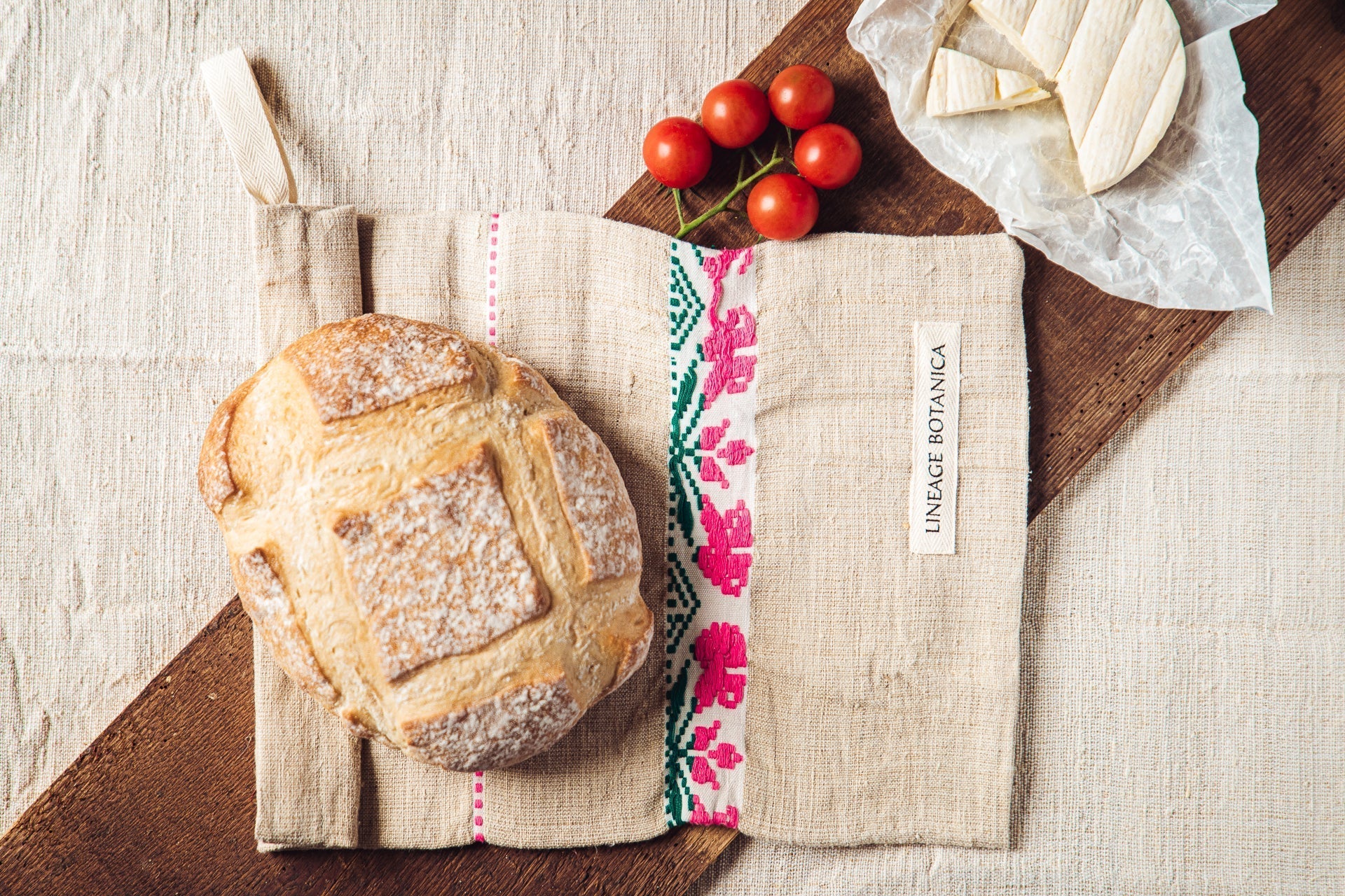 Handwoven antique hemp bread bag with embroidery, featuring vintage design.
