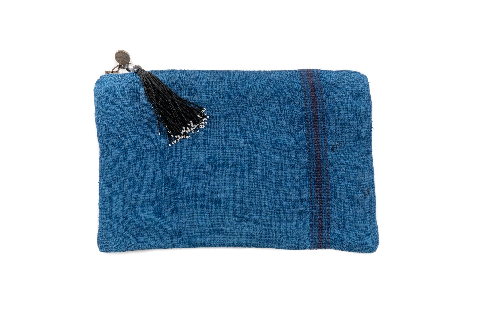 Handwoven antique hemp bag with tassel and zipper, unique design.