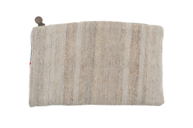 Handwoven wool bag with metal zipper and hemp lining.