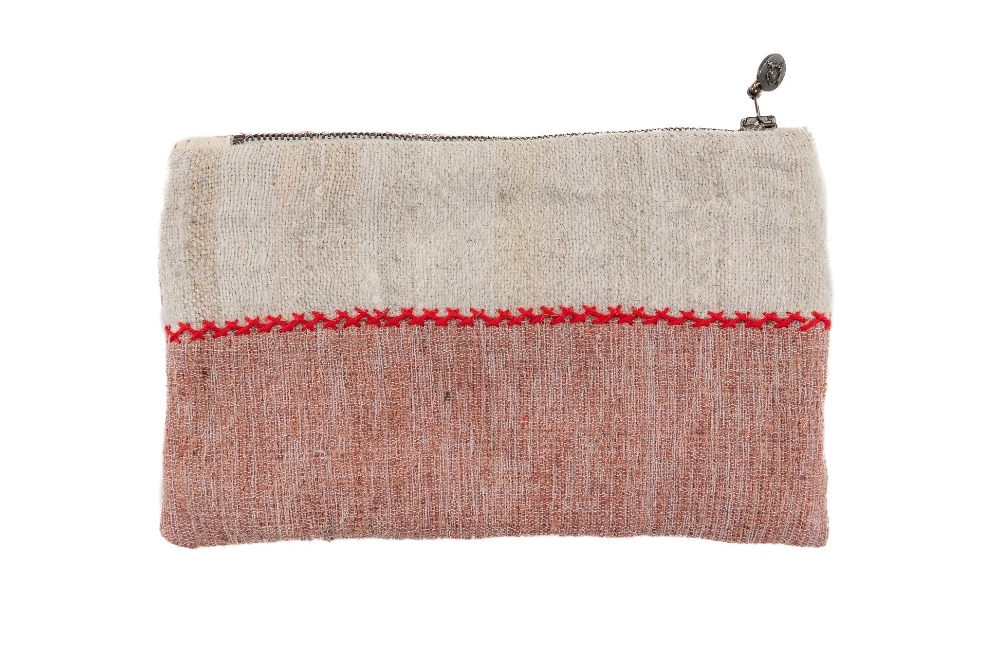 Handwoven wool bag with red stitching, metal zipper, and hemp lining.