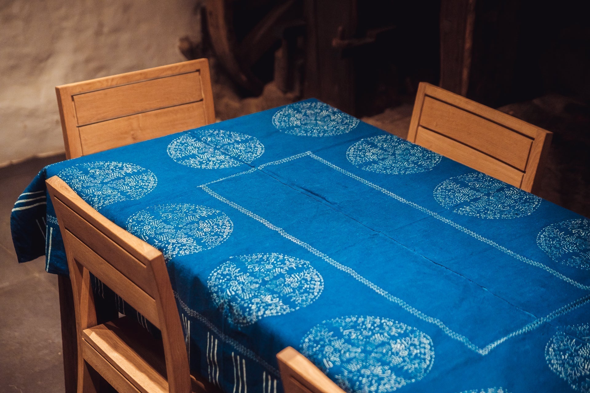 Antique handwoven Hungarian hemp tablecloth with indigo wax resist design.