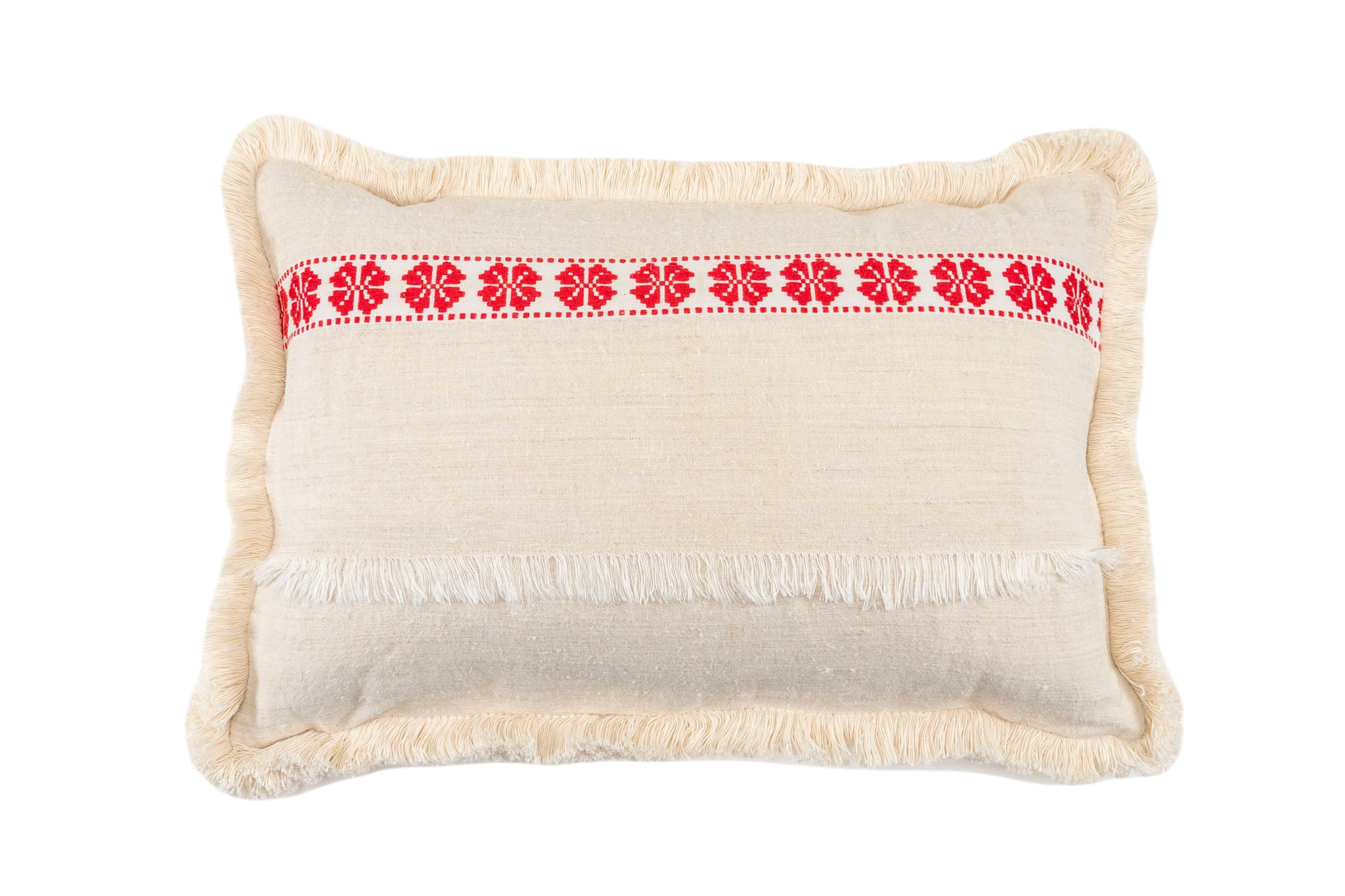 Handwoven antique Hungarian hemp pillow with red carnation pattern and cotton fringe.