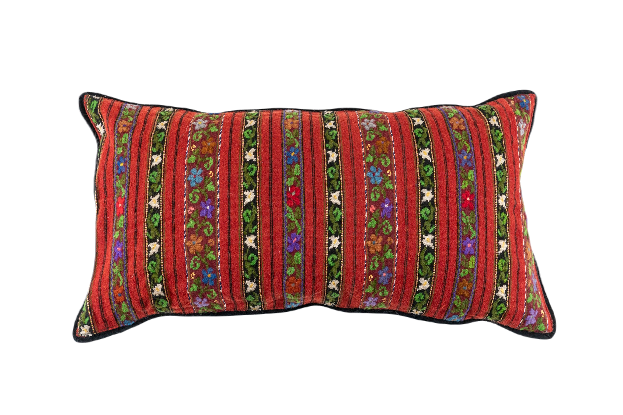 Handwoven Romanian artifact textile pillow with vibrant stripes and floral patterns.