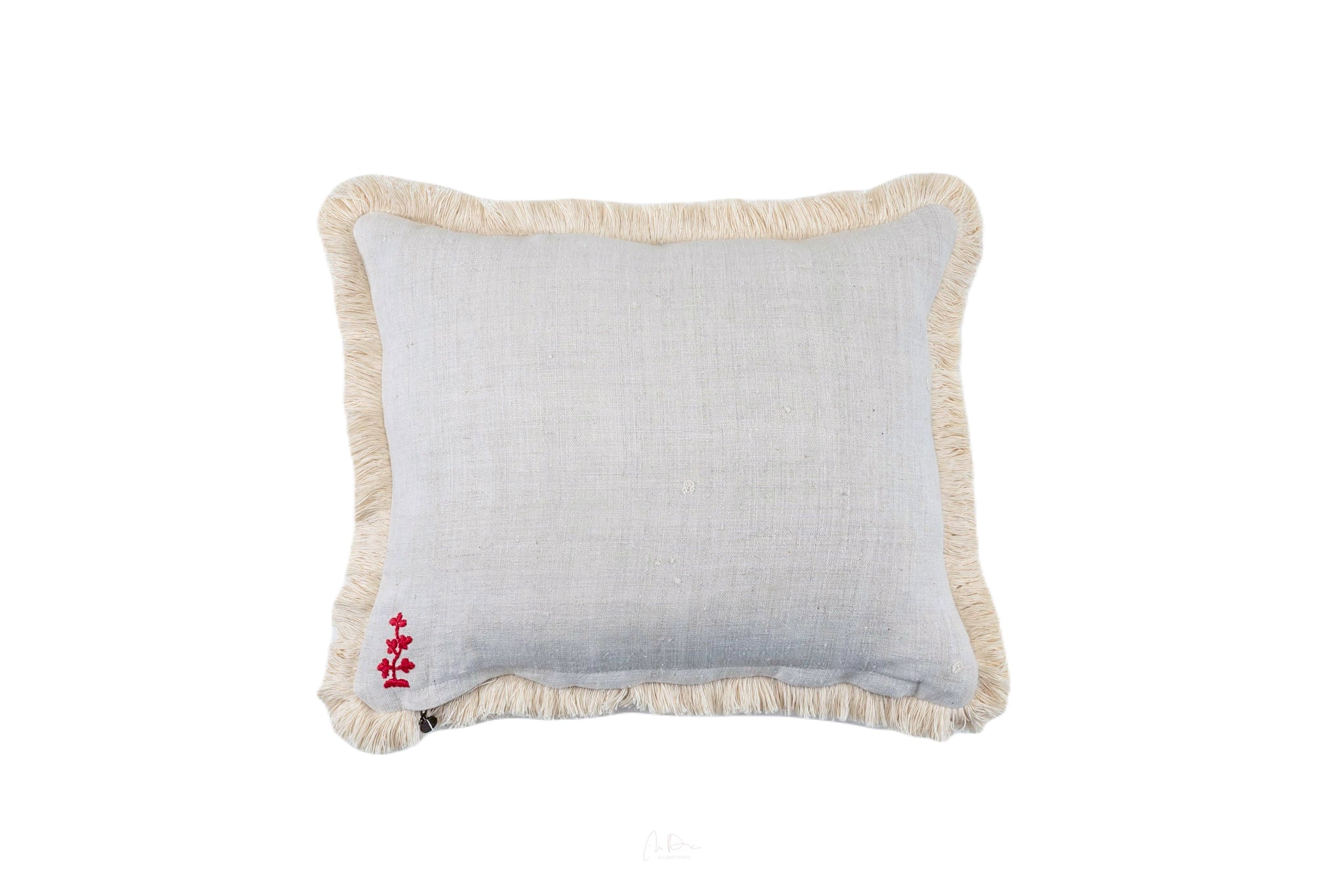 Embroidered antique and vintage Hungarian hemp pillow with fringe detailing.