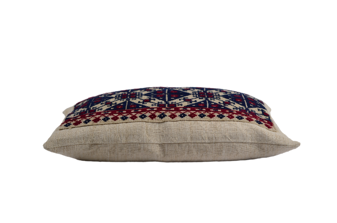 Embroidered handwoven antique Hungarian hemp pillow with colorful design.