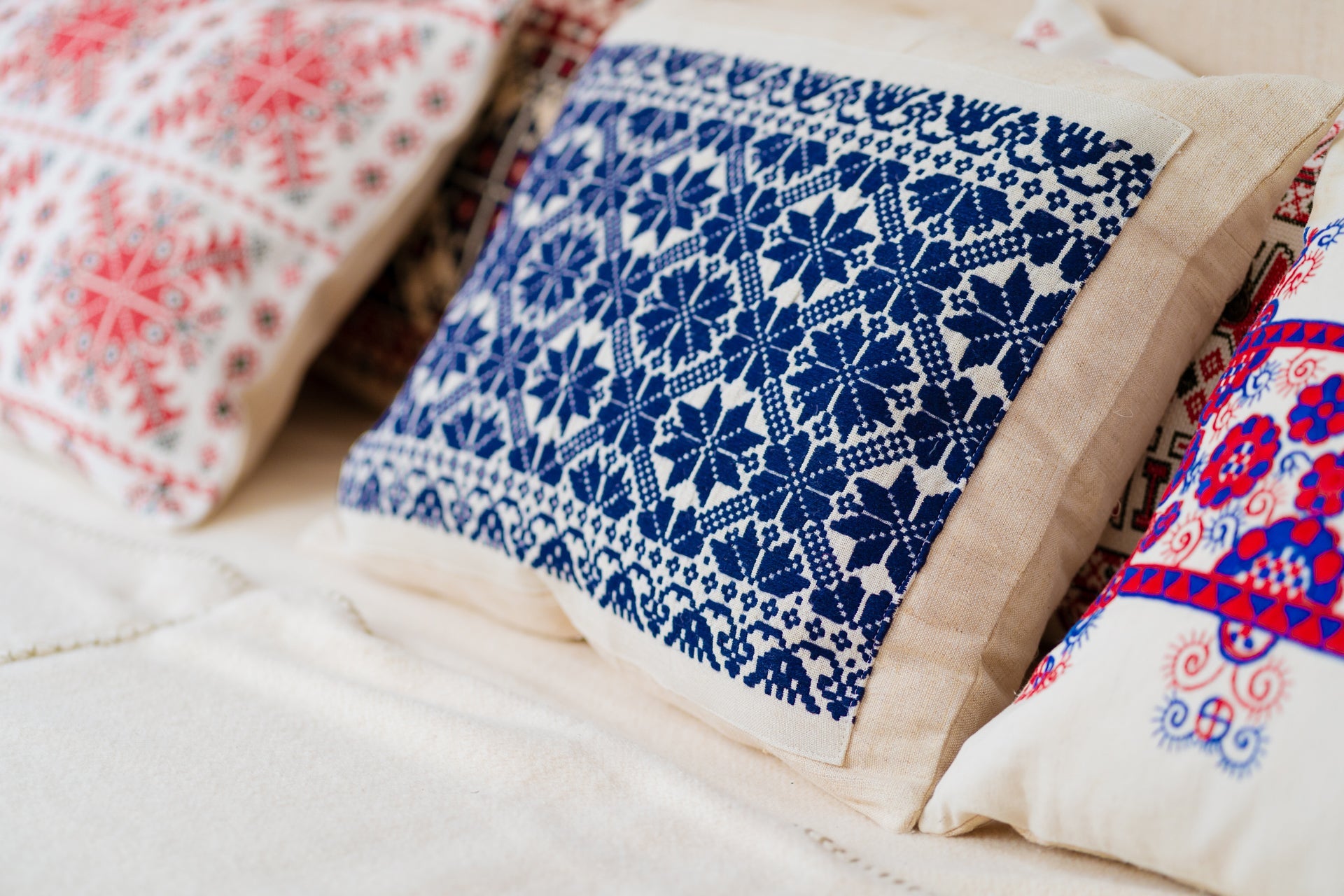 Embroidered handwoven antique Hungarian hemp pillow with blue and red patterns, custom goose down insert, metal zipper.