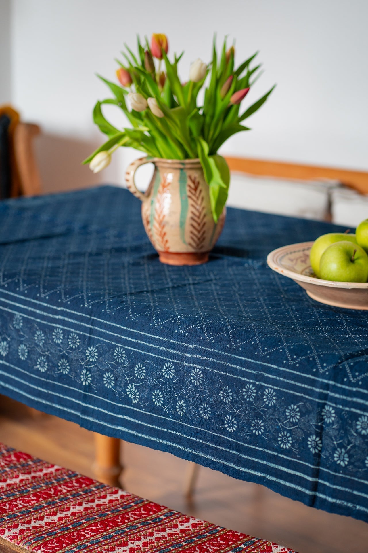 Antique handwoven Hungarian hemp table cloth with indigo dye and heritage patterns.