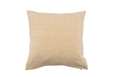 Handwoven cotton pillow, natural plant dye, sustainable home decor.