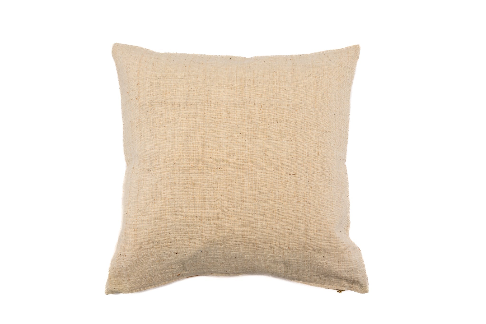 Handwoven cotton pillow with natural plant dye, sustainable home decor.