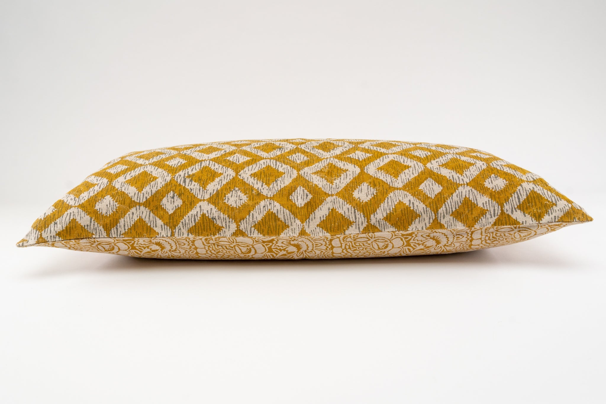 Hand printed linen pillow with geometric design, artisan made in India.