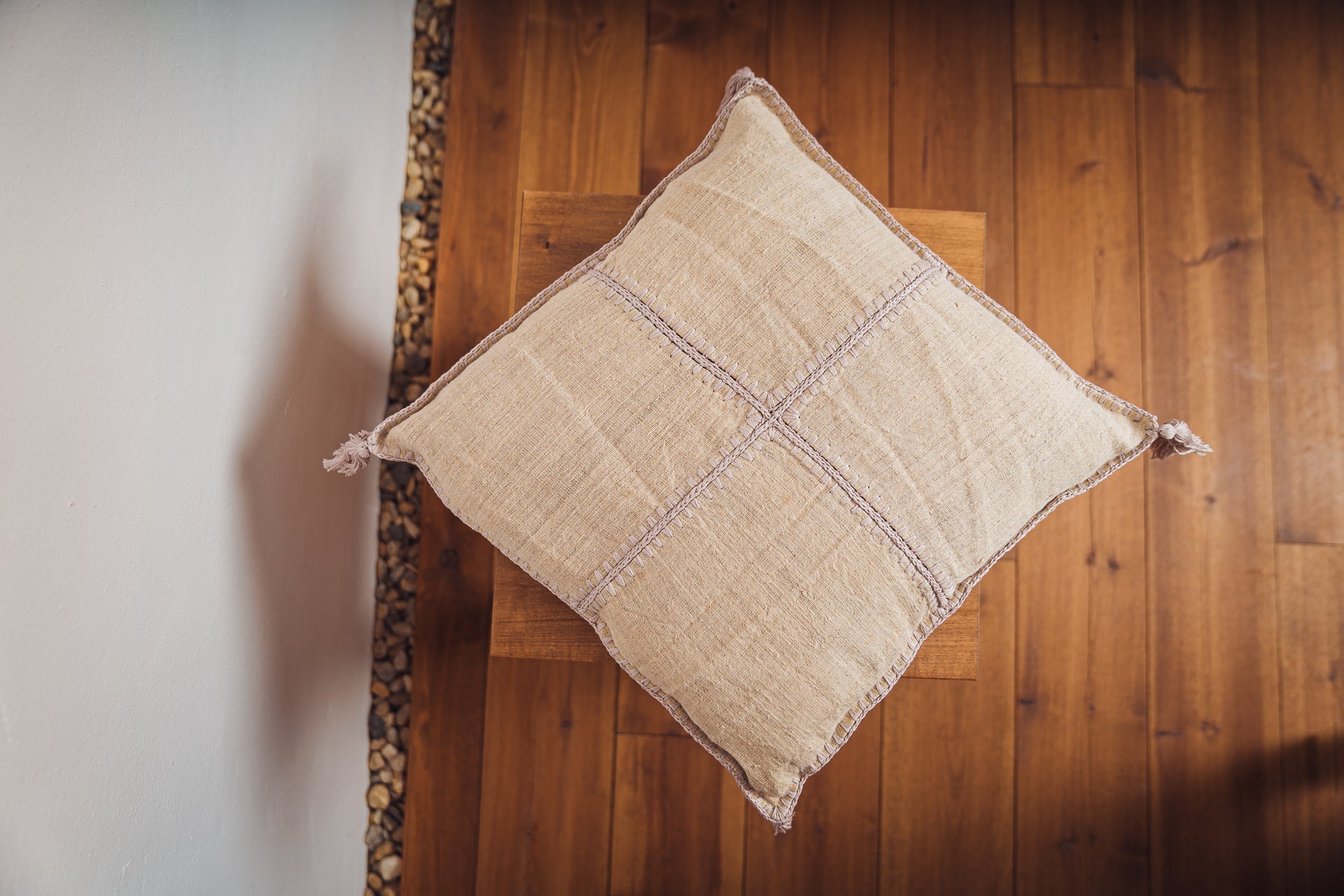 Antique Hungarian handwoven hemp pillow with mauve and taupe stitching, featuring sustainable artisan craftsmanship and a recycled down insert.