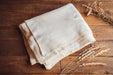 Organic eco-cotton blanket with natural trim, loom woven, artisan made.