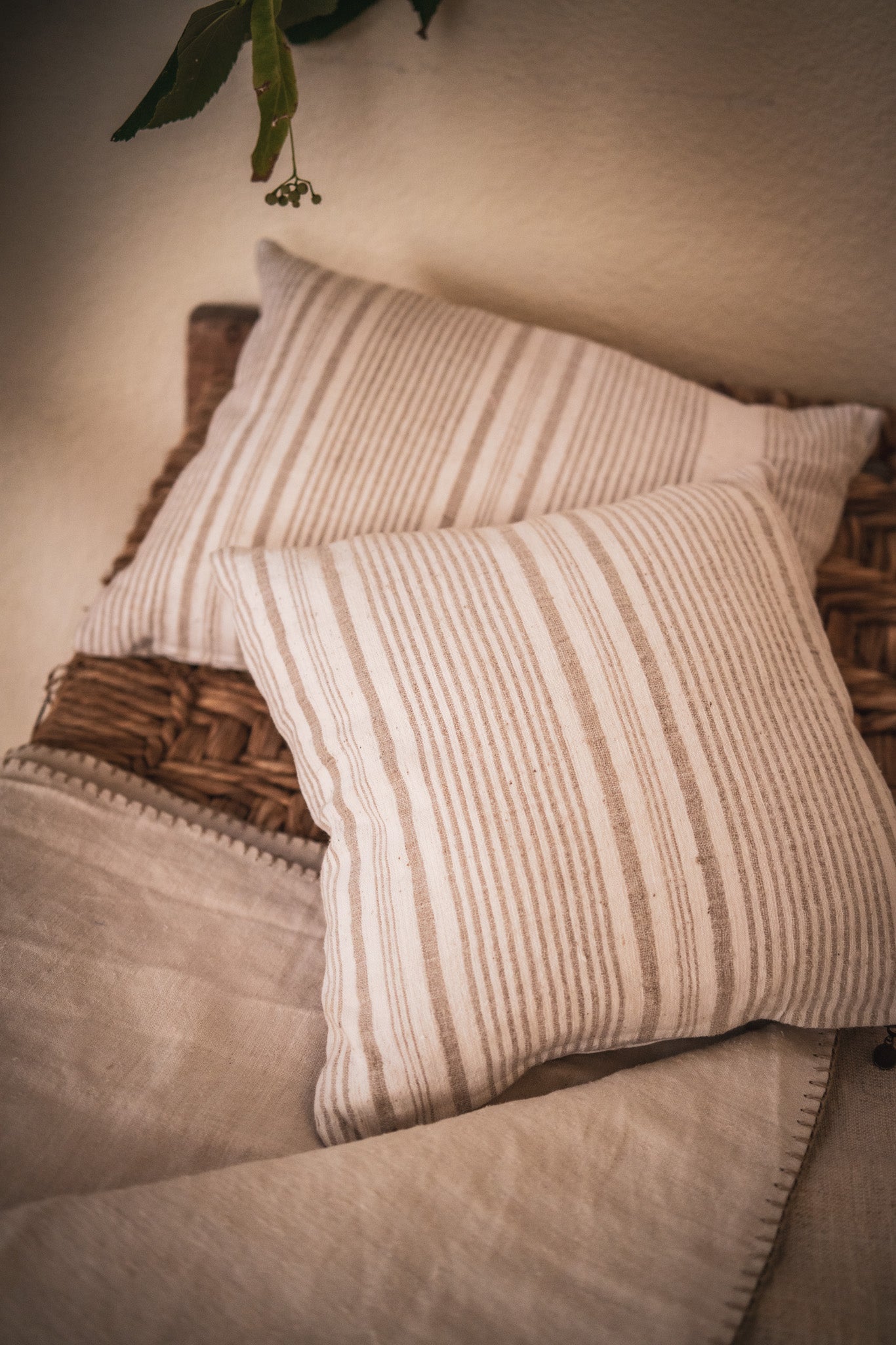 Antique handwoven Bulgarian silk and cotton pillow with neutral hemp back.