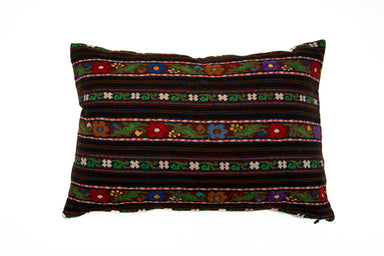 Artifact textile pillow, handwoven in Romania, with colorful ceremonial design.