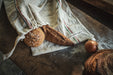 Handwoven antique and vintage hemp baguette bread bags displaying rustic design.