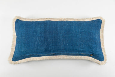 Handwoven antique Hungarian hemp pillow with indigo back and cotton fringe.