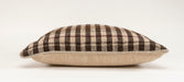 Handwoven antique Bulgarian woolen textile pillow with brown and beige checkered pattern.