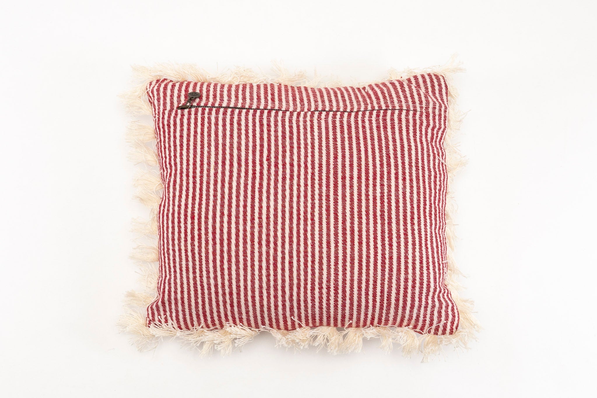 Handwoven antique Bulgarian cotton pillow with red stripes and cotton fringe.