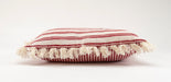 Handwoven antique Bulgarian cotton pillow with fringes and red stripes.