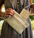 Handwoven wool bag with hemp lining, zero waste design, Kutch craftsmanship.