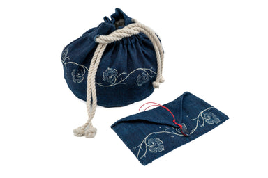 Handwoven antique Hungarian indigo hemp bag and envelope with rope drawstring.