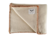 Eco-cotton throw with cinnamon hand stitching and luxurious softness.