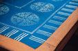 Antique handwoven Hungarian hemp table cloth with indigo wax resist design.