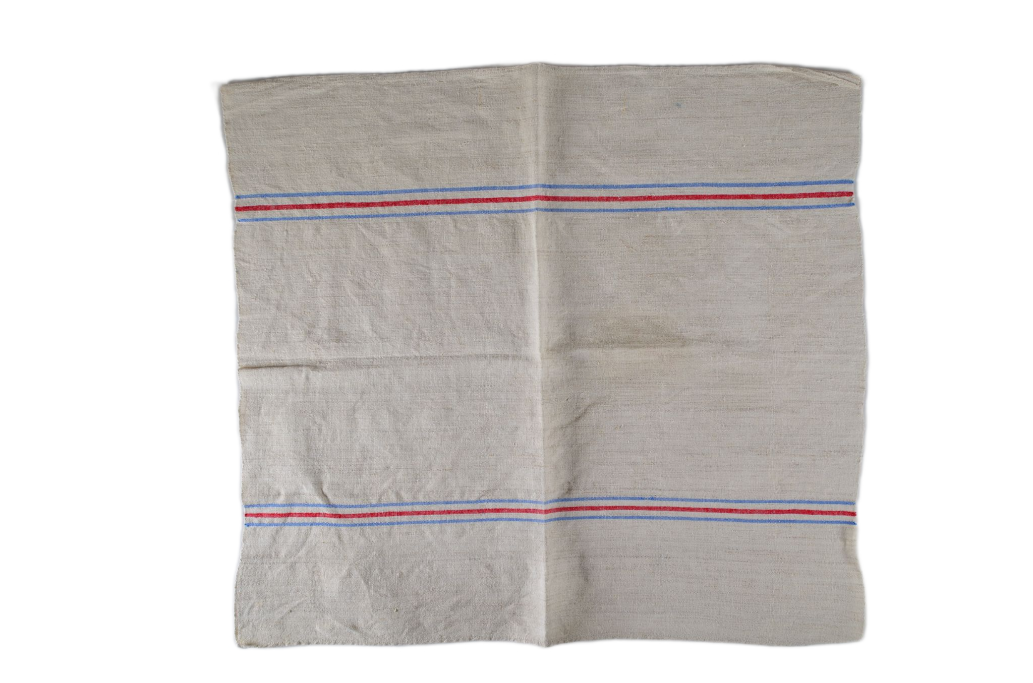 Handwoven antique Hungarian hemp towel with red and blue stripes.