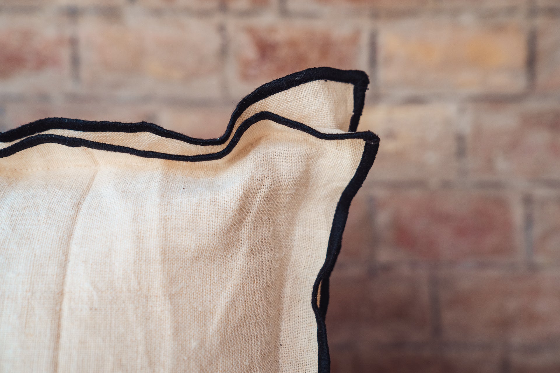 Pillow: Antique handwoven decorative pillow with black trim - P467