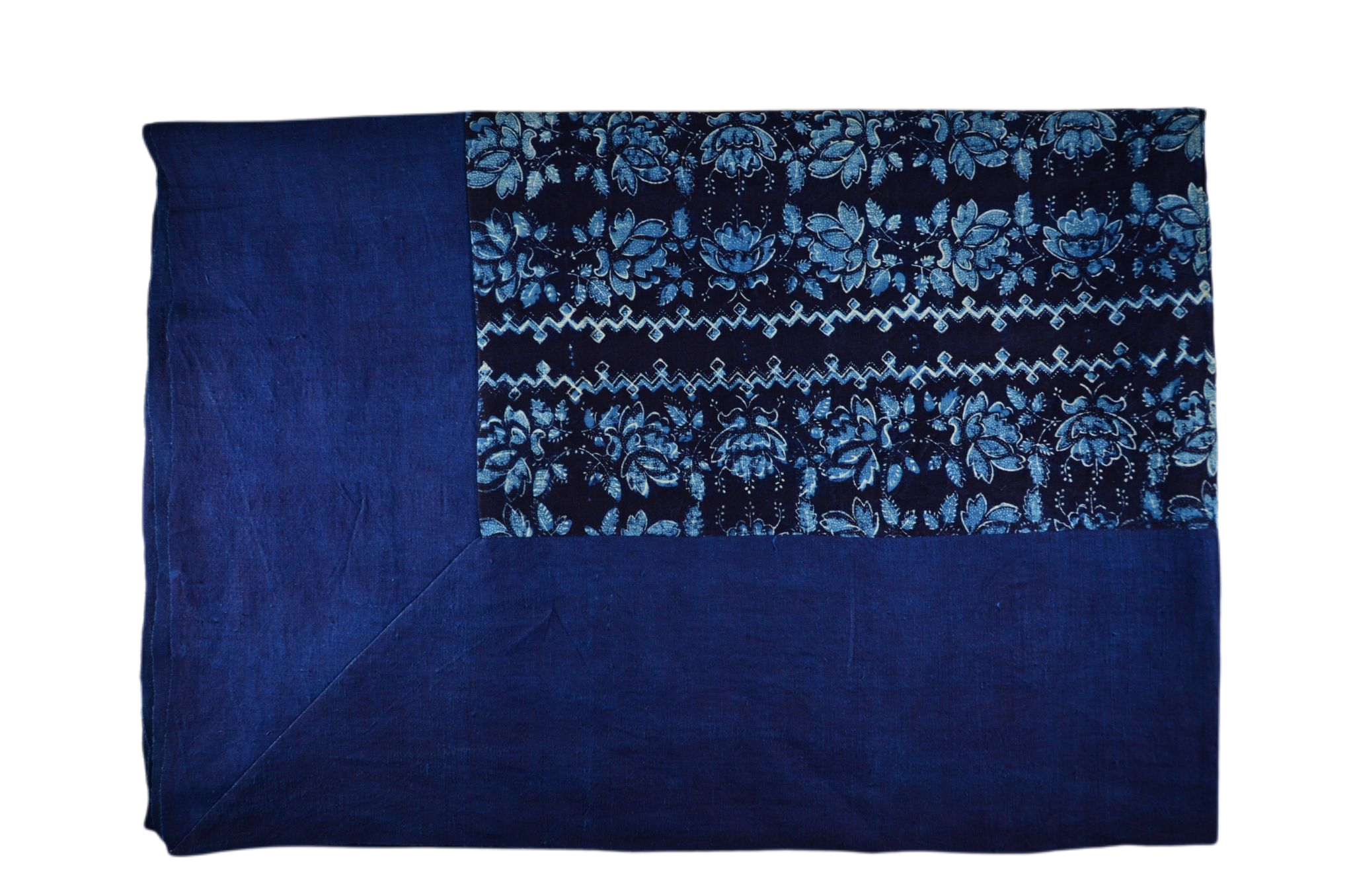 Antique handwoven Hungarian hemp table cloth with indigo wax resist dye and floral pattern.