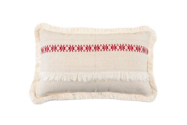 Embroidered antique handwoven Hungarian hemp pillow with intricate red stitching and fringe detailing.