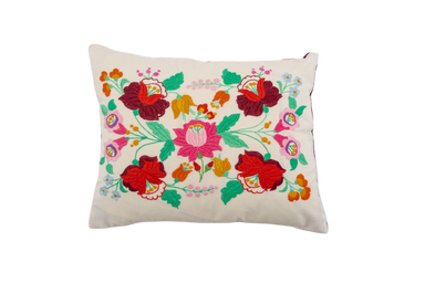 Embroidered handwoven antique Hungarian hemp pillow with floral design.