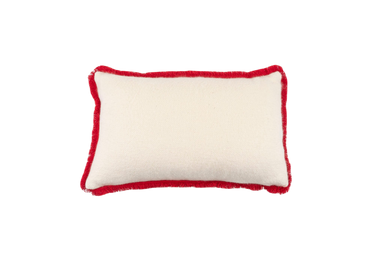 Embroidered antique handwoven Hungarian hemp pillow with red trim.