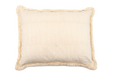 Handwoven hemp cloth cushion with fringe detailing, showcasing eco-friendly natural texture and rustic elegance.