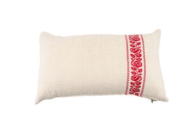 Handwoven antique Hungarian hemp pillow with red embroidered detail.