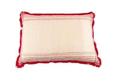 Antique handwoven decorative pillow with red trim and striped details on Hungarian hemp fabric.