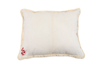 Embroidered antique pillow with intricate patterns and vintage appeal.