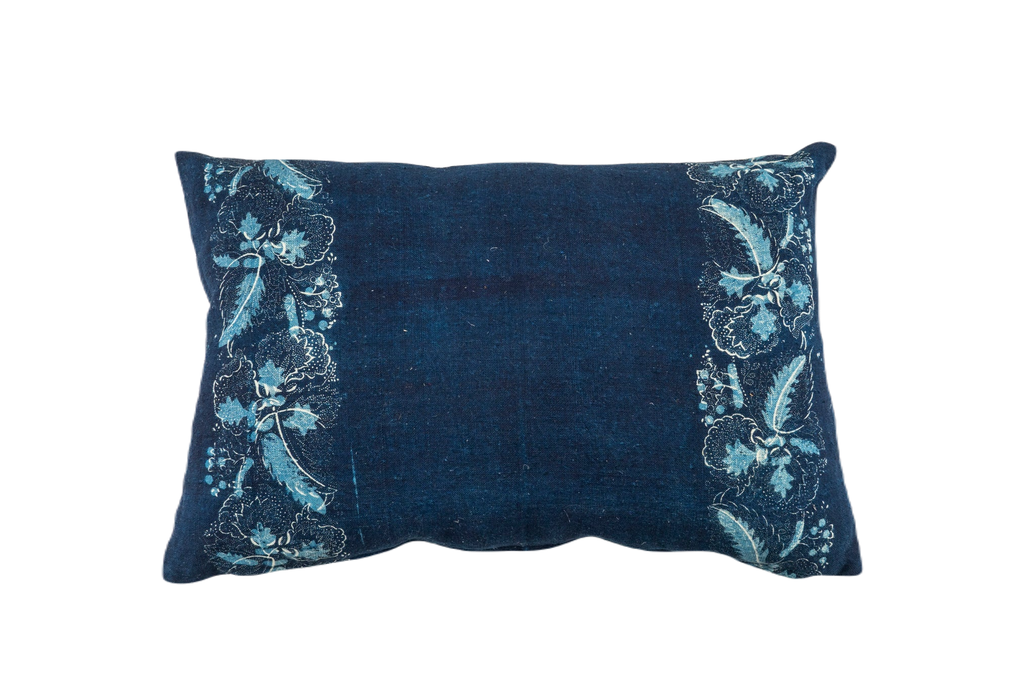 Handwoven antique Hungarian hemp pillow with indigo dye and floral pattern.