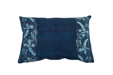 Handwoven antique Hungarian hemp pillow with indigo dye and floral pattern.