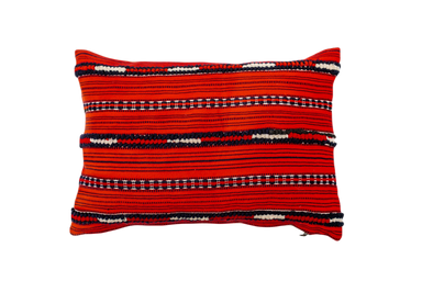 Handwoven antique Hungarian hemp pillow with red and multicolored stripes.