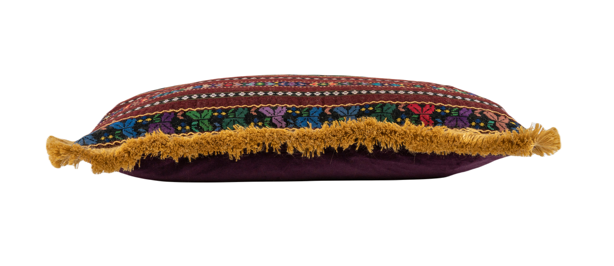 Handwoven Romanian Textile Pillow with intricate patterns and fringe details.