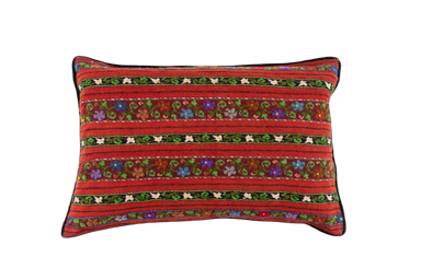 Artifact textile handwoven pillow from Romania with colorful patterns and cotton velvet back.