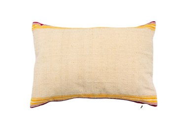 Antique handwoven decorative pillow with colorful striped accents.