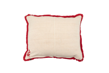 embroidered antique Hungarian hemp pillow with red trim and intricate design